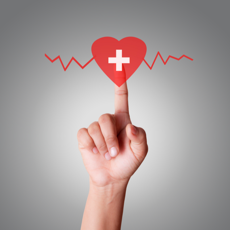 Main-touche-un-coeur-avec-electrocardiogramme-formation-secourisme-CFP_CFA_LE_VERGER_GENNES_VAL_DE_LOIRE